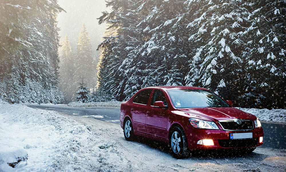 Photo of a well-cared for red car.